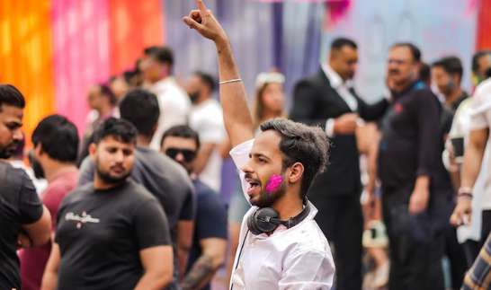 Guests celebrating at Holiest 2023 at The Lalit, Delhi