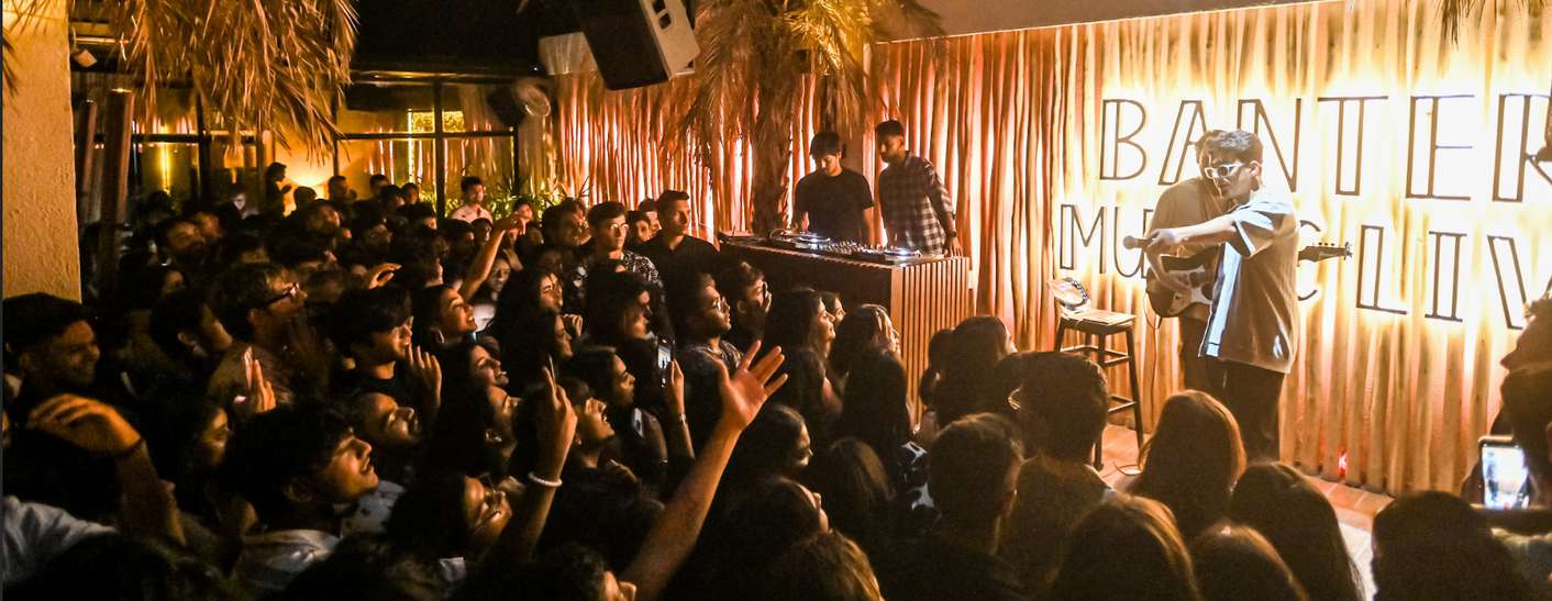 A crowd gathered in a club room